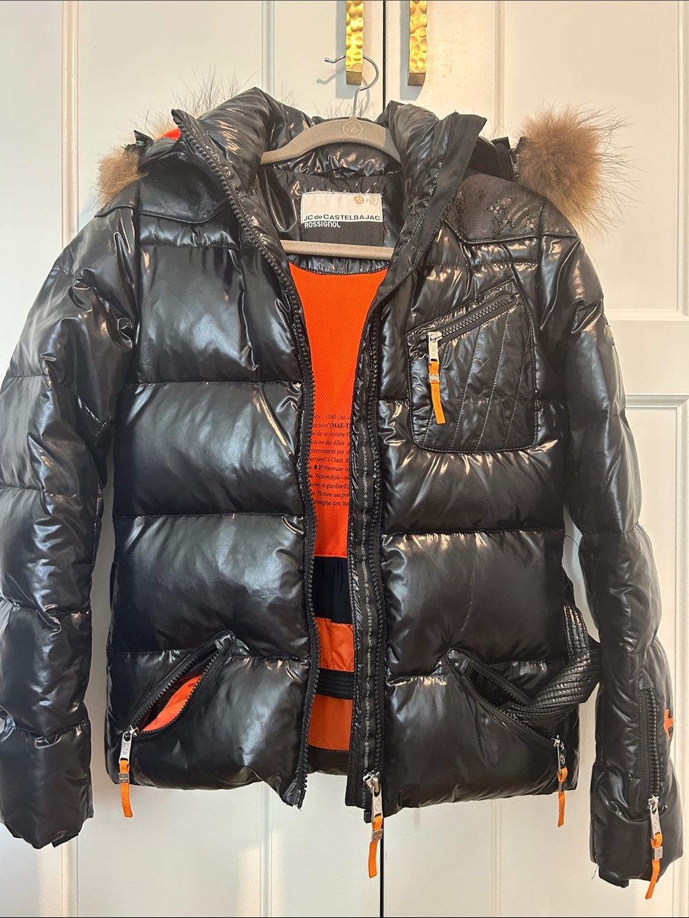 Rossignol Ski Jacket black glossy with contrasting orange details